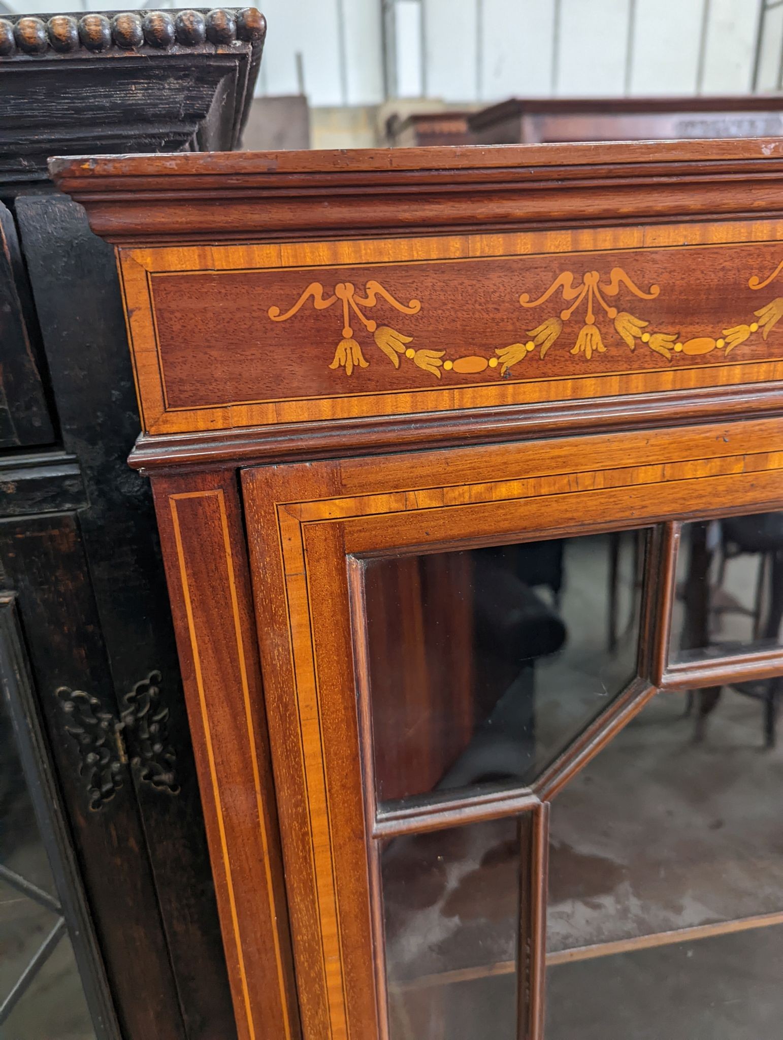An Edwardian inlaid mahogany standing corner cabinet, width 62cm, depth 41cm, height 145cm
